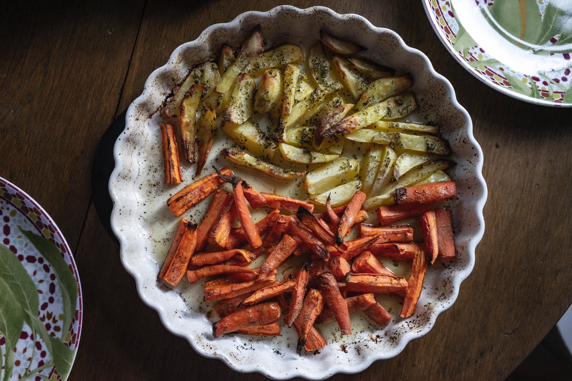 plate with fried potato and carrot